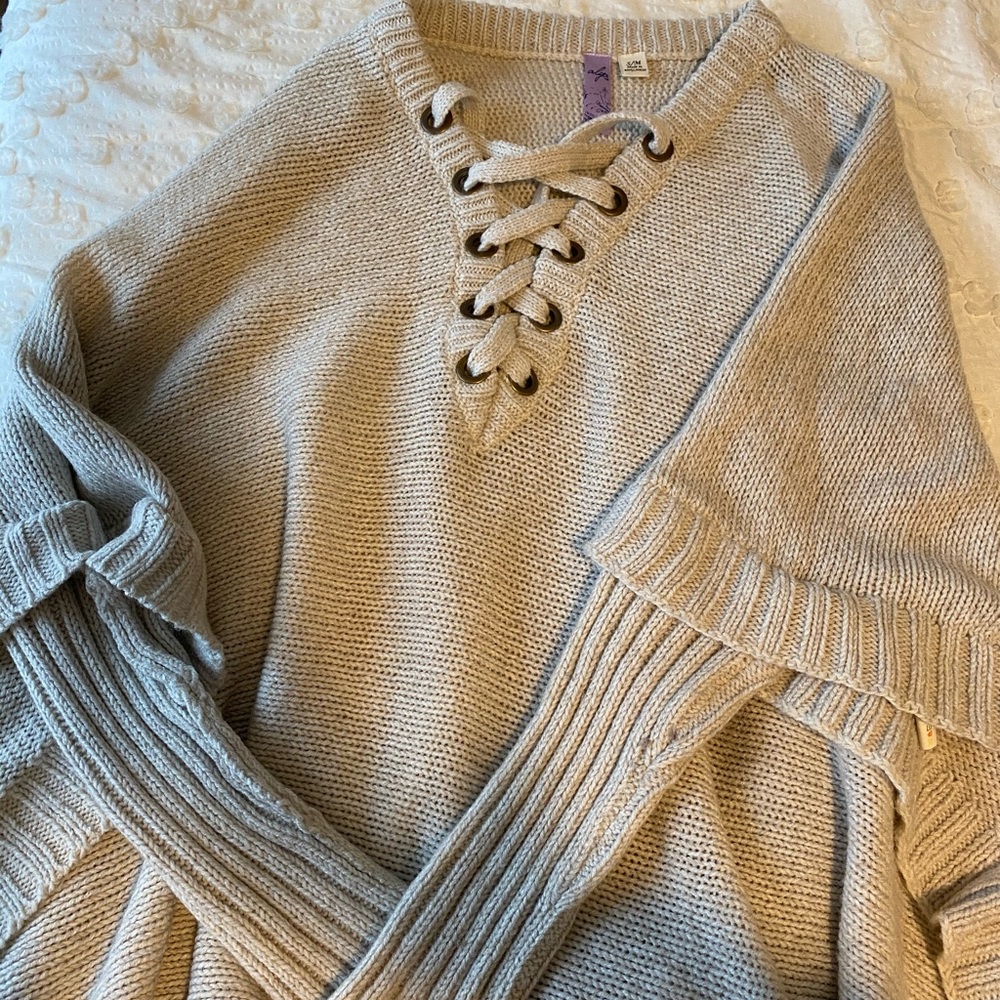 Long cream sweater open on sides